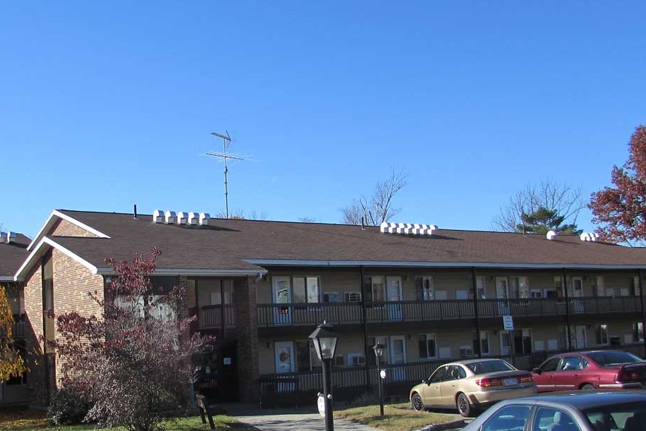 Rainbow Terrace building exterior and parking lot